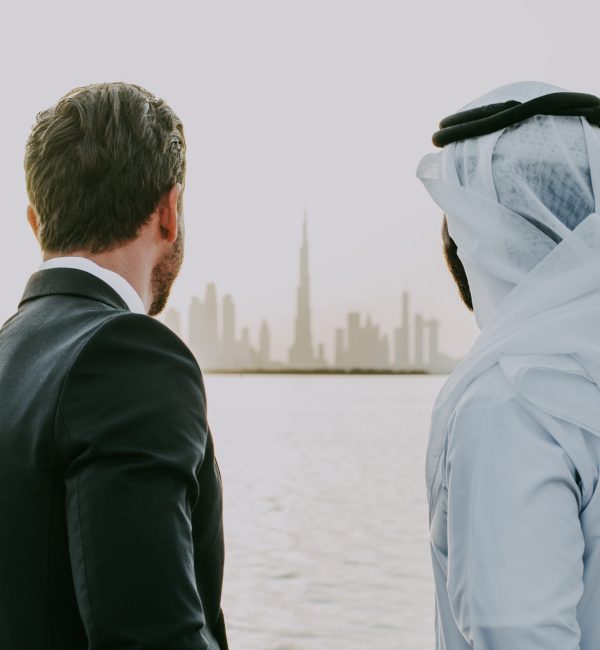 Business,Team,Talking,About,Future,Plans,In,Dubai